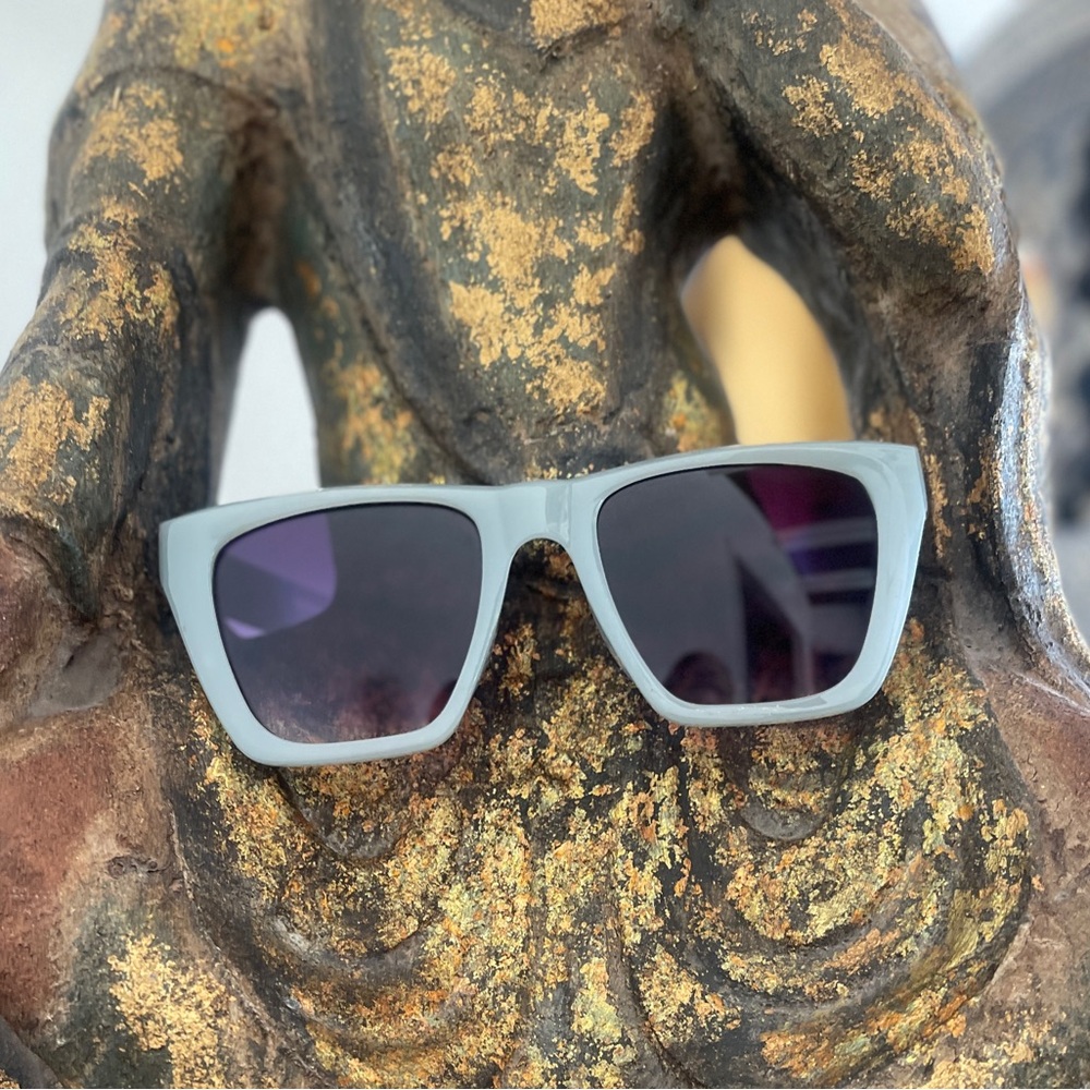 Light blue/grey sunglasses by MCM Designs